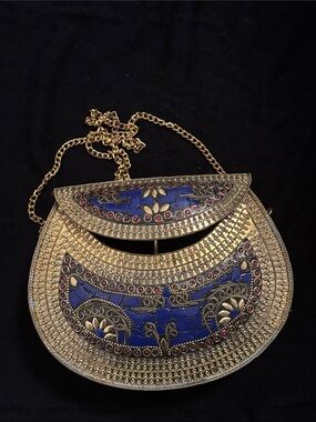 Mosaic metal clutch with chain strap. Blue